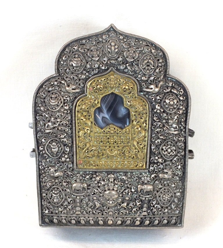 Tibetan Gau religeous travelling box: Tibetan Gau religeous travelling box 7" x 6" x 2 3/4". Wonderful design with birds, elephants, etc. Probably with silver and gold, not tested