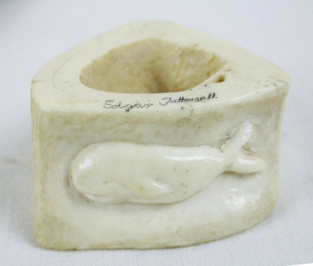 Inuit signed scrimshaw carving with whale: Inuit signed scrimshaw carving with whale. 2" wide, signed by the artist