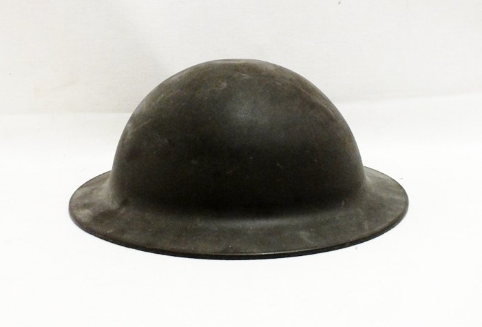 WWI Military helmet: WWI Military helmet. Inscribed with a name and labeled inside.
