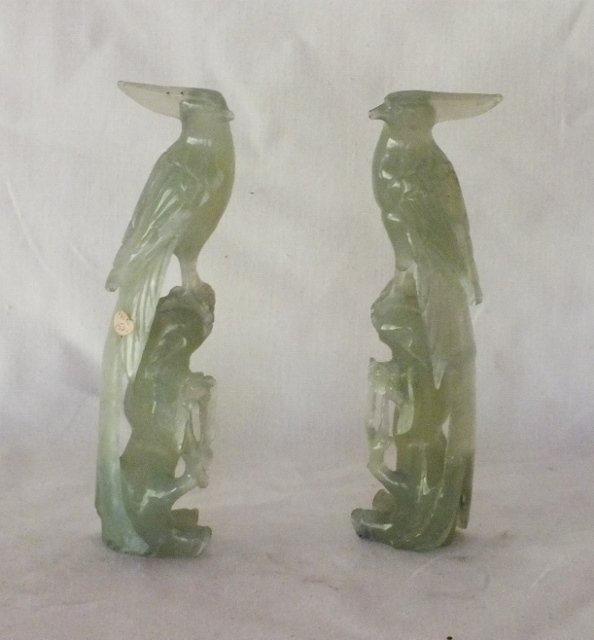 Pair of Chinese jade carved birds: Pair of Chinese jade carved birds 7 1/2" tall. Bought in 1970's and still have the original price tag of $150.