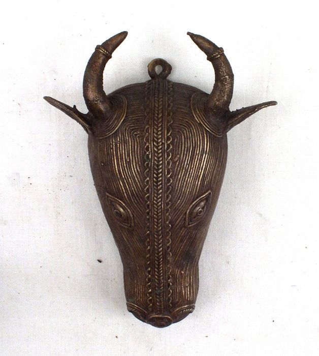 Carved bronze cow head (1 of 7)