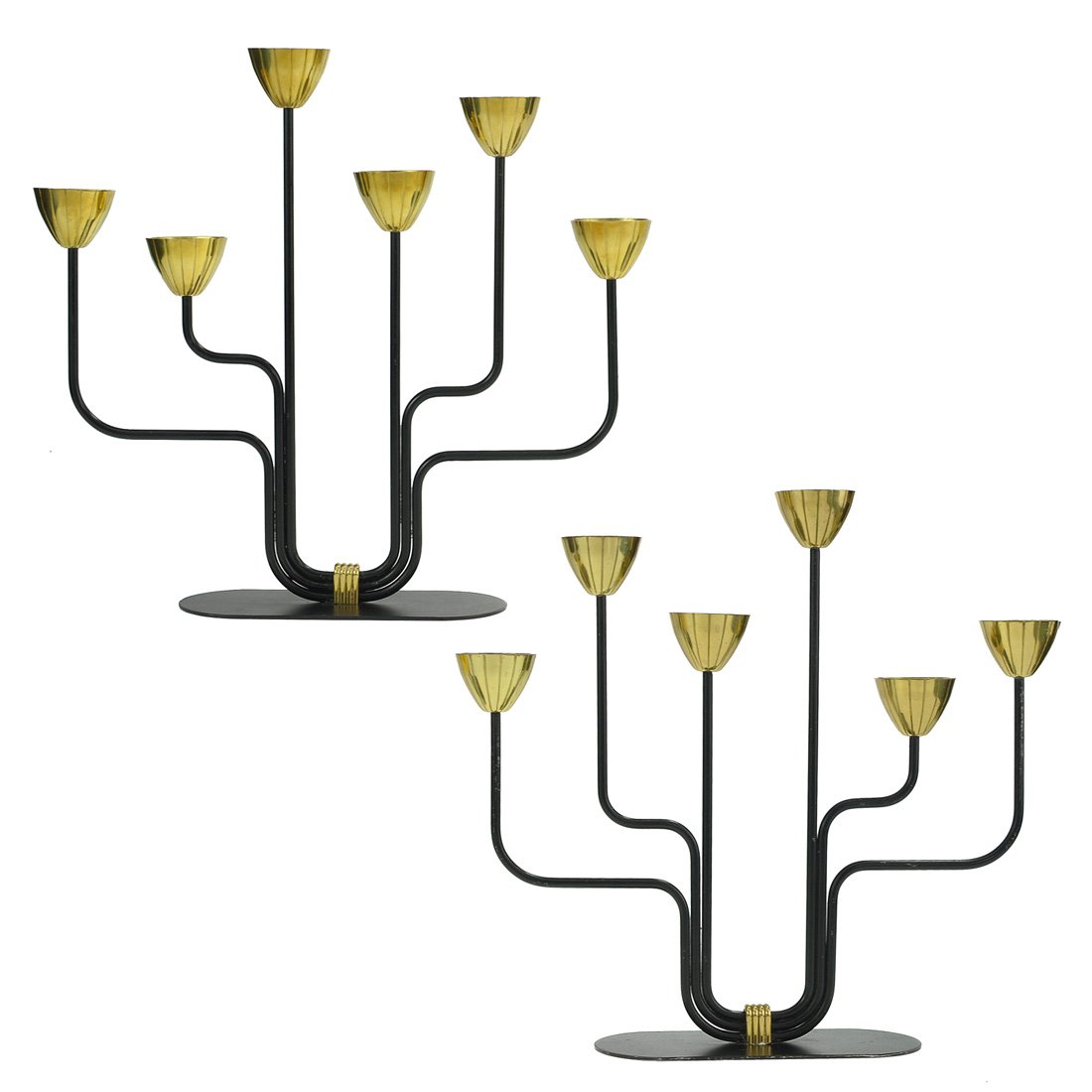 LJUSSTAKE, 1 par, mässing, GUNNAR ANDER, Ystad Meta: 6 ljusarmar i mässing på svartlackerad stomme. Oval fot. Undersida stämplad "YSTAD METALL MADE IN SWEDEN". Smärre slitage. Höjd 26.5, bredd 29 cm.