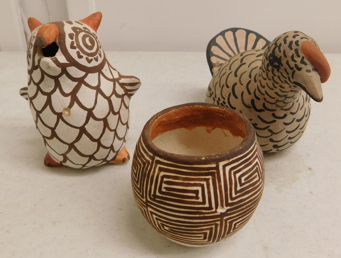 3 Pueblo Pottery Items: 3 Pueblo Pottery Items, circa 1950s. Made of clay and paint, the items measure from 2" to 5" long. New Mexico. Condition: Good, see images. Shipping: $24.50 w/insurance and signature.