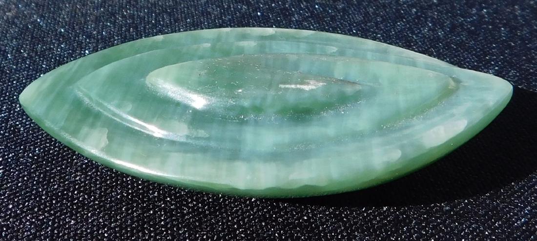 New Zealand Jade Carving: New Zealand Jade Carving, 20 th century item. Made of jade, the item measures 2.5" x 1.5" x 0.5". Maori. Condition: Fine, see images. Shipping: $12.50 w/insurance and signature.