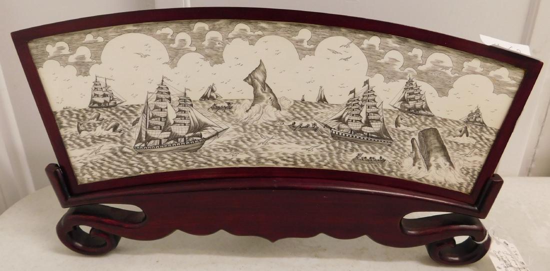 Fine Scrimshaw: Fine Scrimshaw, circa 1950s. Made of bone and wood, the item measures 15" x 8" x 2.5" w/stand. Japan. Very fine work throughout. Condition: Very good, see images. Shipping: $25.00 w/insurance and sign