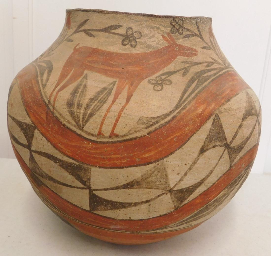 Zia Figured Olla: Zia Figured Olla, circa 1930s. Made of clay and paint, the item has a 5.5" opening with a 3.75" base, and sits 9.25" tall. New Mexico. Deer painted on bowl. Condition: Has cracks, see images. Shipping
