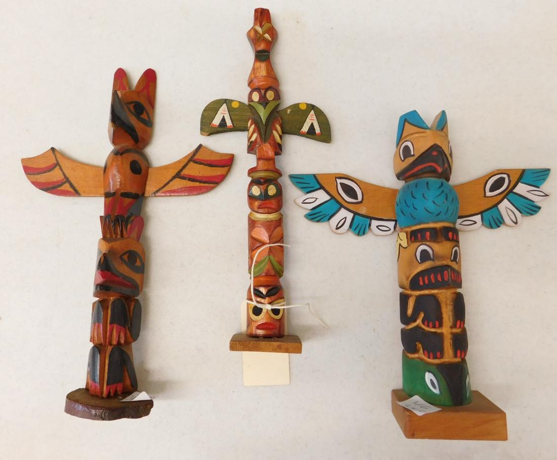 3 Northwest Coast Totems: 3 Northwest Coast Totems, circa 1950s. Made of wood and paint, items measure from 9" to 10.5" tall. Canada. Condition: Good, see images. Shipping: $30.00 w/insurance and signature.