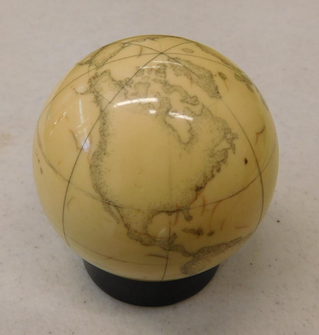 Engraved Cue Ball: Engraved Cue Ball, 2017. Made of hard plastic, the item is 2". California artist Steve Aho. The world globe, signed by artist. Freehand done, fantastic work! Condition: Fine work, see images. Shipping