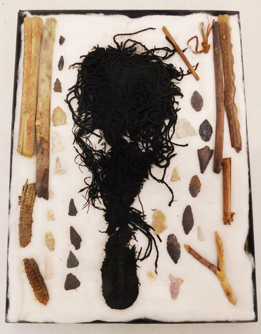 Hohokam Collection: Hohokam Collection, pre-historic items. Made of wood, stone, corn, cotton cloth, the items are of various lengths. Hohokam, Arizona. Center piece appears to be a type of cloth hat or hair ornament. In