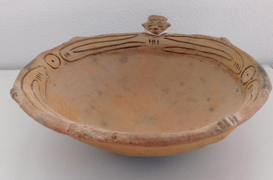 Pre-Columbian Bowl: Pre-Columbian Bowl, pre-columbian item. Made of clay, the item measures 9" x 10" x 3.5". Puerto Rico, Taino. Has effigy on rim. Condition: Old damage, see images. Shipping: $25.50 w/insurance and sign