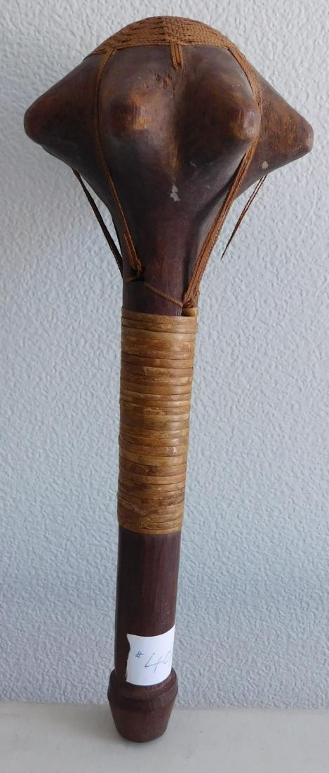 Polynesian War Club w/Helm COA: Polynesian War Club w/Helm COA, circa 1850s. This 19th century war club is made of wood and senet, measuring 4.5" x 4.5" x 13". Rennell Island, Solomon Islands. Helm Certificate of Authenticity. Condi