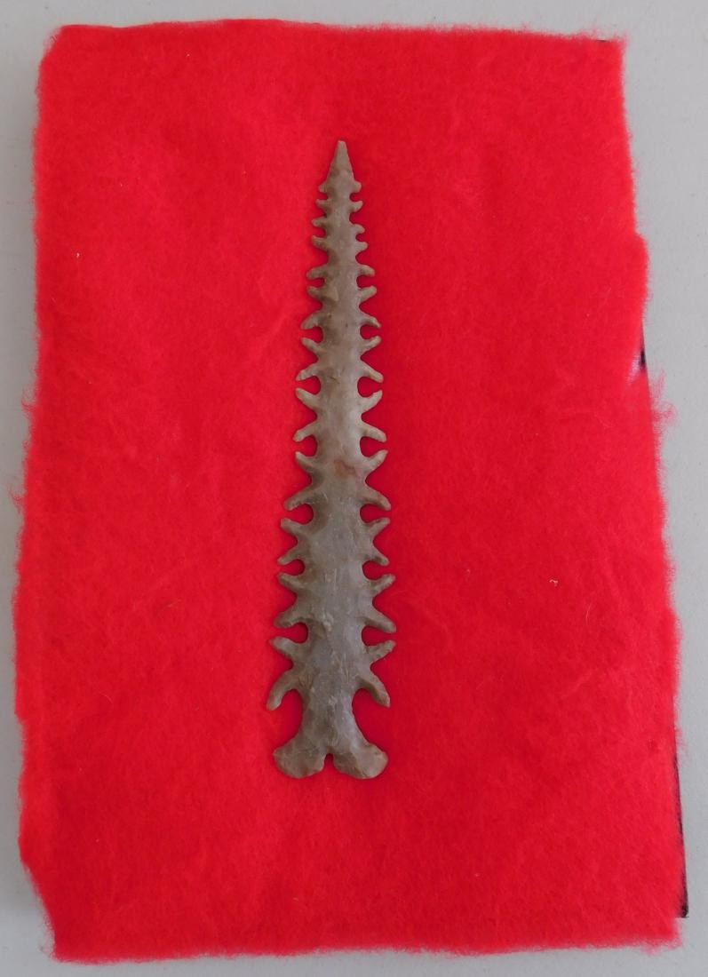 Large Tussinger Eccentric Blade: Large Tussinger Eccentric Blade, circa 1920s. Made of chert, the item measures 1 5/8" x 8 3/4". Oklahoma. Once on display at the Oral Roberts University Museum. One of the largest of the Mack Tussinge