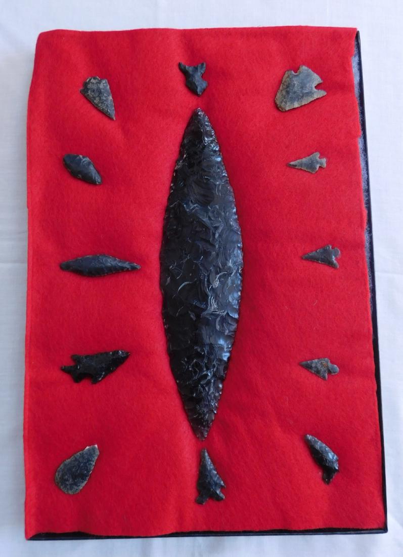 California Artifact Collection: California Artifact Collection, pre-historic items. Made of obsidian, the items measure from 1" to 8" long. Central California. Frame not included. Condition: As found, see images. Shipping: $24.50 w/