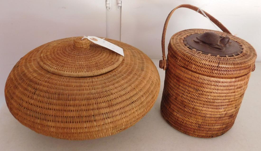 Lidded Indonesian Baskets: Lidded Indonesian Baskets, c. 1960s. Made of wood and stripped bark, the items measure 11" x 6" x 11" and 7" x 6" x 7". Indonesia. Wood figure of frog on lid of smallest basket. Condition: Good, see i