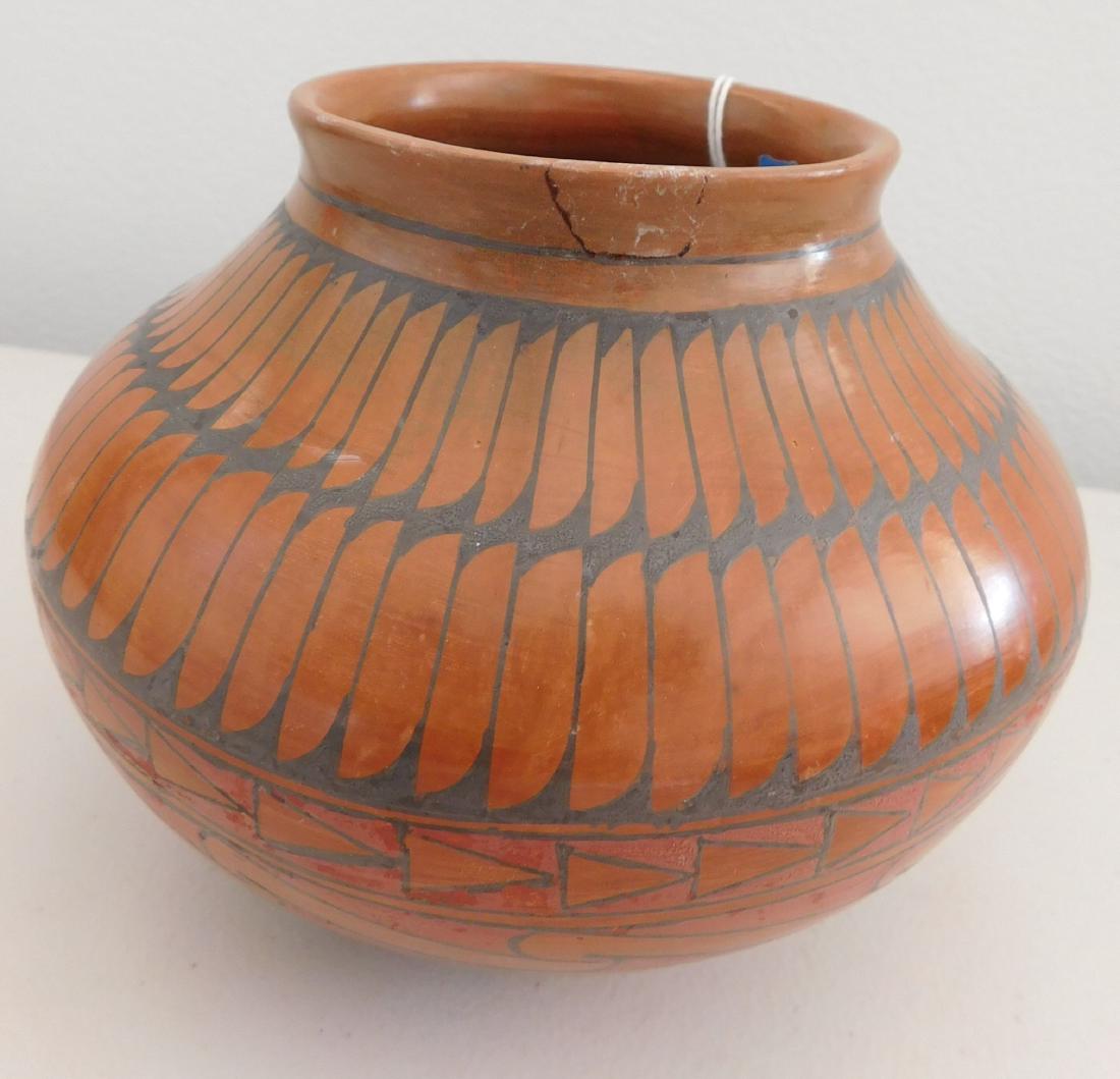 Polychrome Mata Ortiz Olla: Polychrome Mata Ortiz Olla, c. 1970s. Made of clay and paint, the item measures 6.5" x 6.5" x 5". Paty Ortiz, Mata Ortiz, Mexico. Fantastic knifewing design and additional painting around lower portio