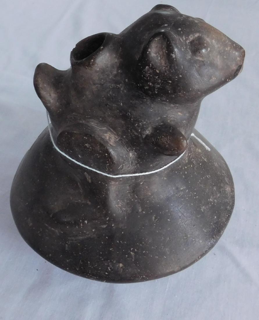 Squirrel Effigy Pot: Squirrel Effigy Pot, pre-historic item. Made of clay and measuring 7" x 7". Arkansas. Nice, effigy pot. Condition: Good, see images. From an old, 1960s California collection. Shipping: $34.50 w/insura