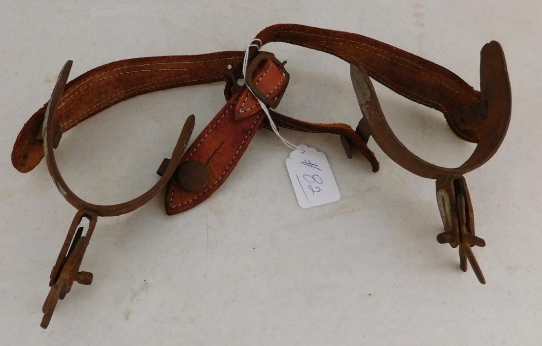 Pair of Antique Mexican Spurs: Pair of Antique Mexican Spurs, c. 1900. M ade of leather, steel and silver, the items measure approx. 3" x 9" each. Leo Carrillo Ranch. San Diego County, Calif. Condition: Worn, some silver loss, see 