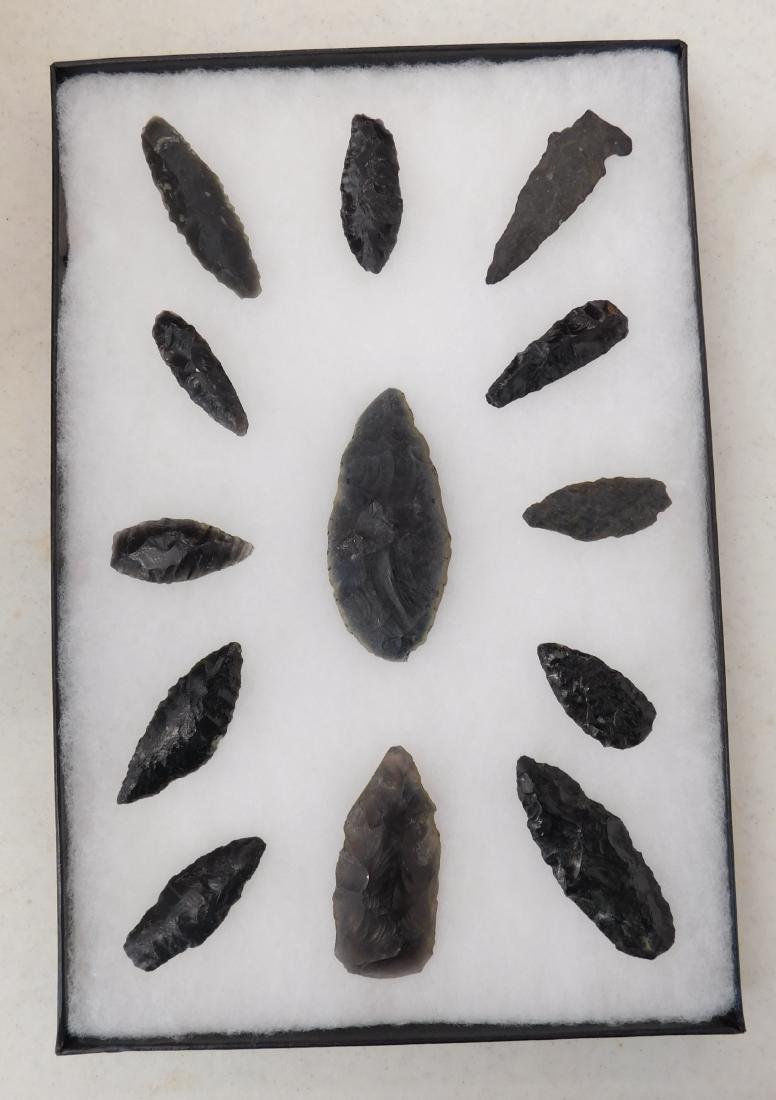 California Obsidian Collection: California Obsidian Collection, pre-historic items. Made of obsidian, the longest artifact is 3" long. Lake County, California. Many cascade points and early man points. Frame not included. Condition: