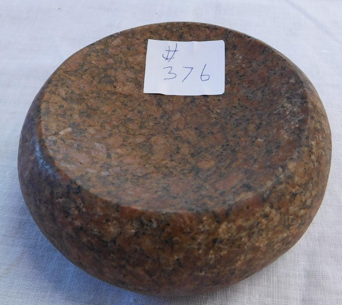 Discoidal Game Stone: Discoidal Game Stone, pre-historic item. Made of red granite, the item measures 4 1/4" x 1 1/2". Cook County, Illinois. Deep cups. Condition: Good, see images. Shipping: $16.50 w/insurance and signatu