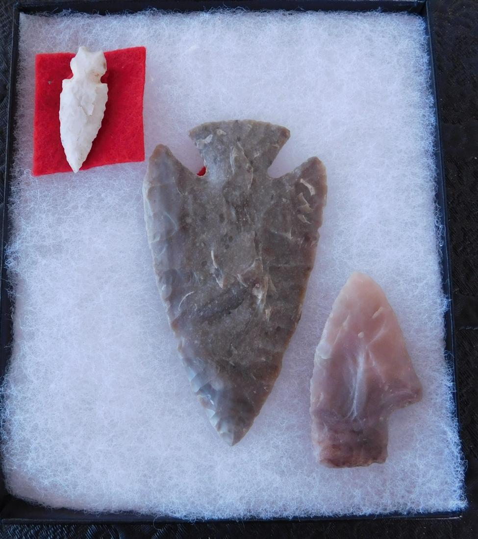 Arkansas Flint Collection: Arkansas Flint Collection, pre-historic item. Made of novaculite chert, the item measures 3 3/4". Craighead County, Arkansas. Frame not included. Lost Lake, single shoulder bird point. Condition: Good