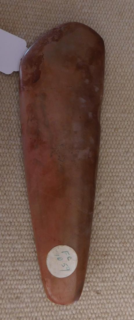 Flint Celt: Flint Celt, pre-historic item. Made of jasper flint, the item measures 7" long. Central Arizona. Nice polish. Condition: Good, see images. Shipping: $14.50 w/insurance and signature.