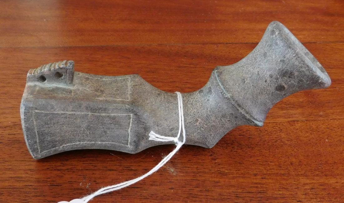 Elbow Angle Pipe: Elbow Angle Pipe, early historic period. Made of steatite, the item measures 6" long. North Carolina. Condition: Good, see images. Shipping: $22.50 w/insurance and signature.