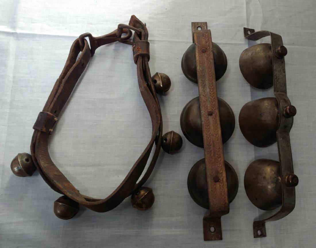 Antique Sleigh Bells: Antique Sleigh Bells, c. 1890s. Made of brass and steel, the items measure 6" x 9" and 2 3/4" x 12". USA. Nice collection of old bells. Condition: Good, see images. Shipping: $24.50 w/insurance and si