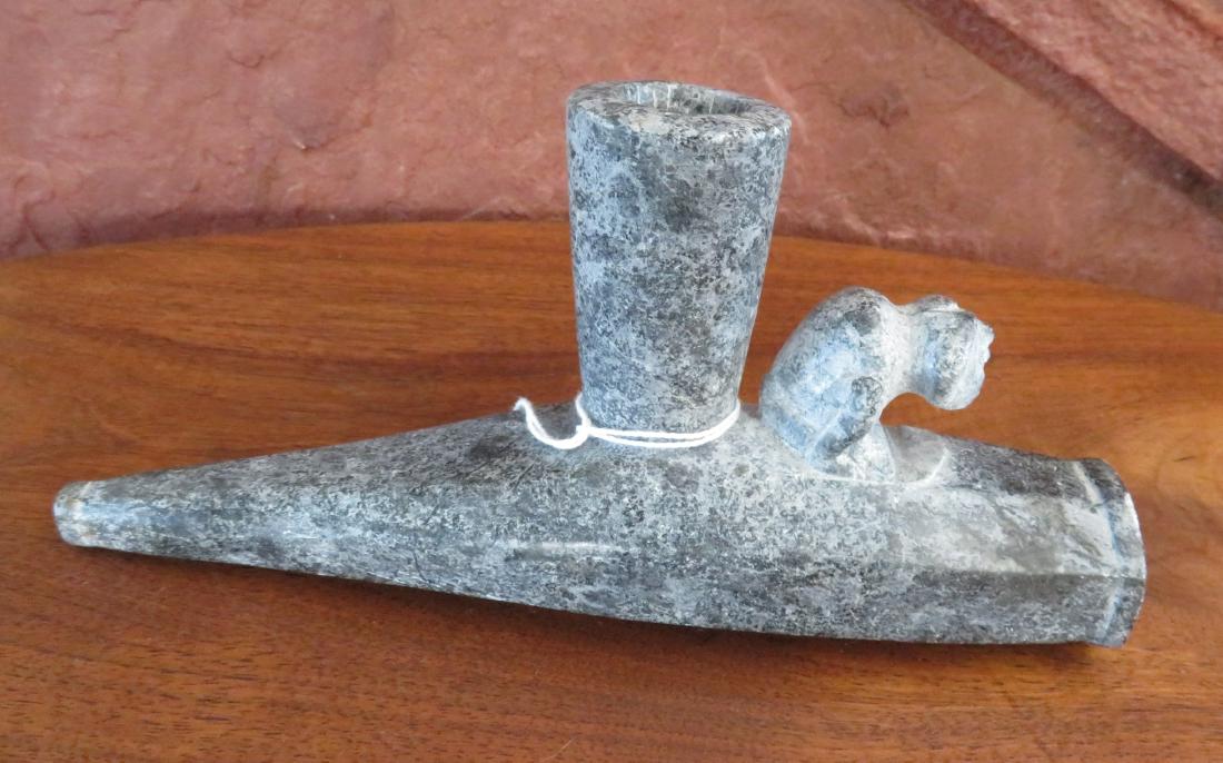 Zoomorphic Effigy Pipe: Zoomorphic Effigy Pipe, pre-historic item. Made of steatite, the item measures 7 1/2" x 2" x 3 1/2". Indiana. Condition: As found, see images. Shipping: $25.50 w/insurance and signature, due to length