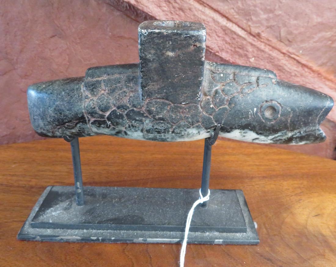 Effigy Fish Pipe w/Stand: Effigy Fish Pipe w/Stand, pre-historic item. Made of steatite, the item measures 6 1/2" x 1 1/4" x 2 1/2". Virginia. Condition: As found, see images. Shipping: $24.50 w/insurance and signature.
