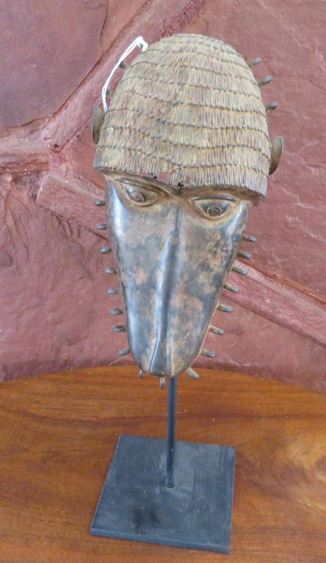 Benin Bronze Monkey Mask w/Stand: Benin Bronze Monkey Mask w/Stand, late 19th century item. Made of bronze alloy, the item measures 10". Nigeria. Condition: Good, see images. Shipping: $32.50 w/insurance and signature, due to value.