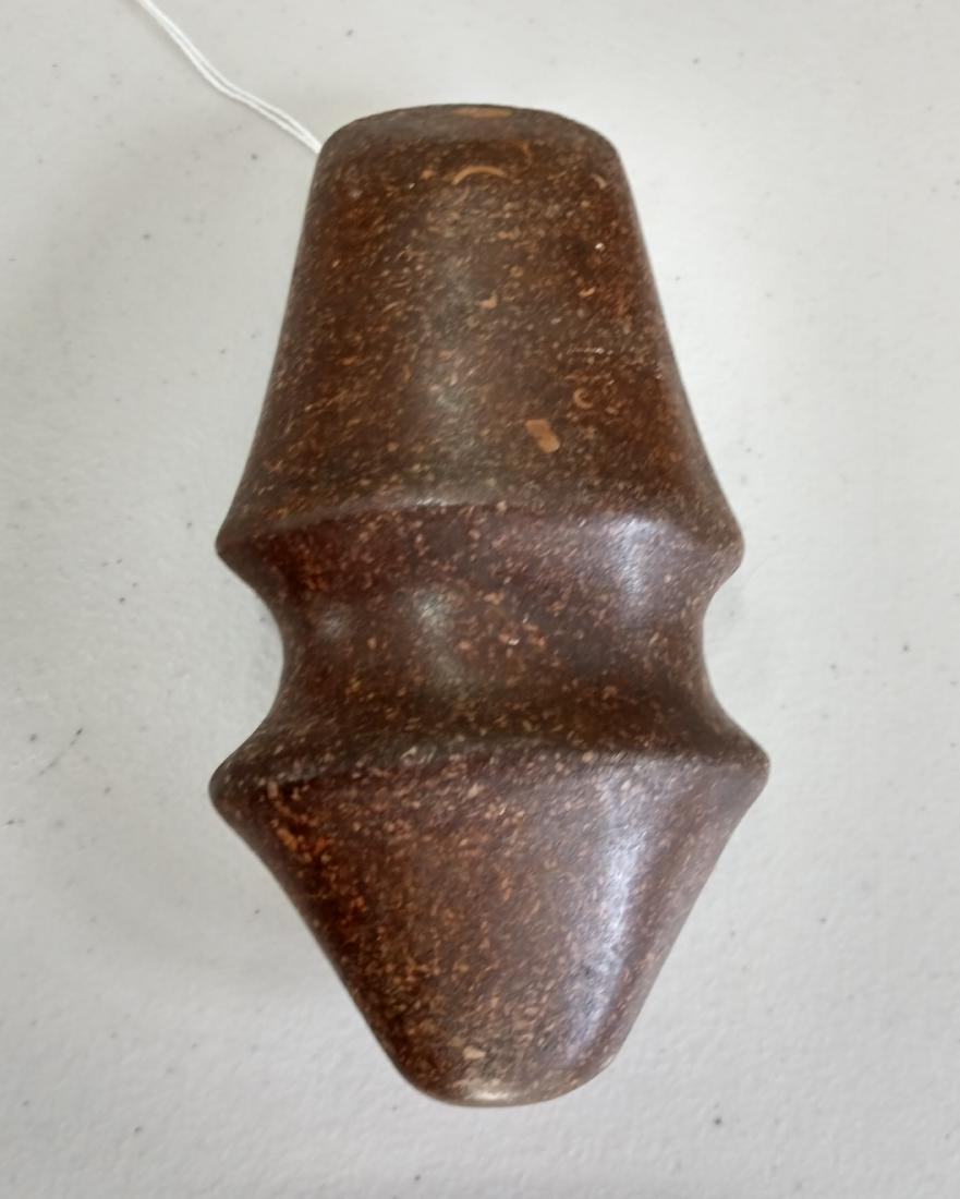 Michigan Barbed Axe: Michigan Barbed Axe, pre-historic item. Made of granite, the item measures 6" long. Michigan. Nice ridge. Condition: Good, see images. Shipping: $18.50 w/insurance and signature.