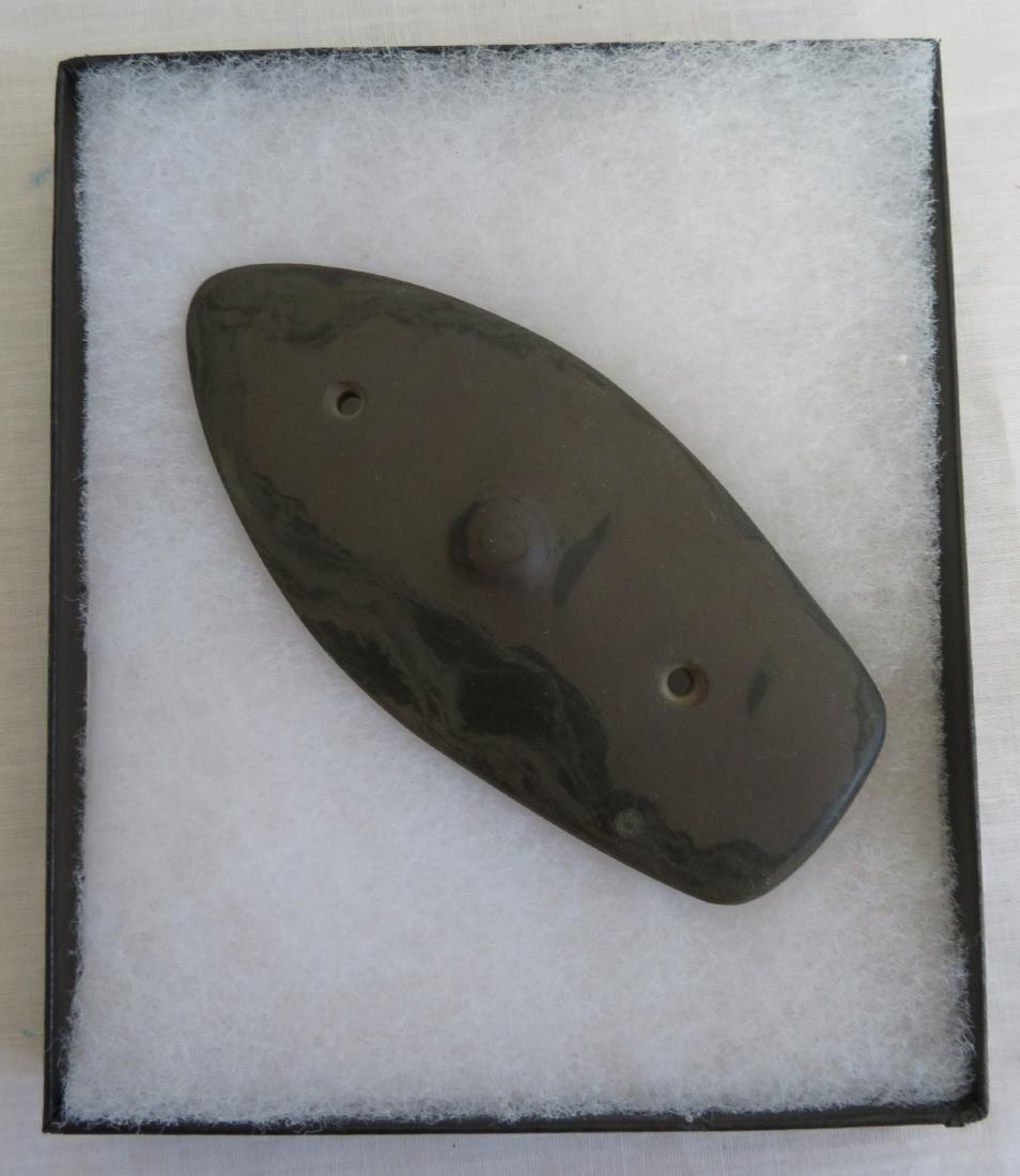 Slate Humpback Gorget w/Helm COA: Slate Humpback Gorget w/Helm COA, Hopewell era. Made of banded slate, the item measures 4 3/4" x 2 1/4". Randolph County, Indiana. Helm Certificate of Authenticity. Condition: Good, see images. Shippi