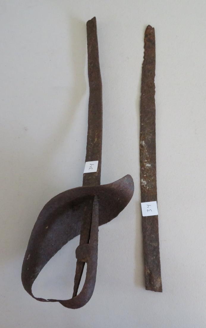 Antique Sword: Antique Sword, Spanish Colonial period. Made of metal, possibly steel, the item fragments measure 17 1/2" and 18 1/2" long. Spanish Colonial. Found in 2 pieces. Condition: Dug up in Del Mar, Californi