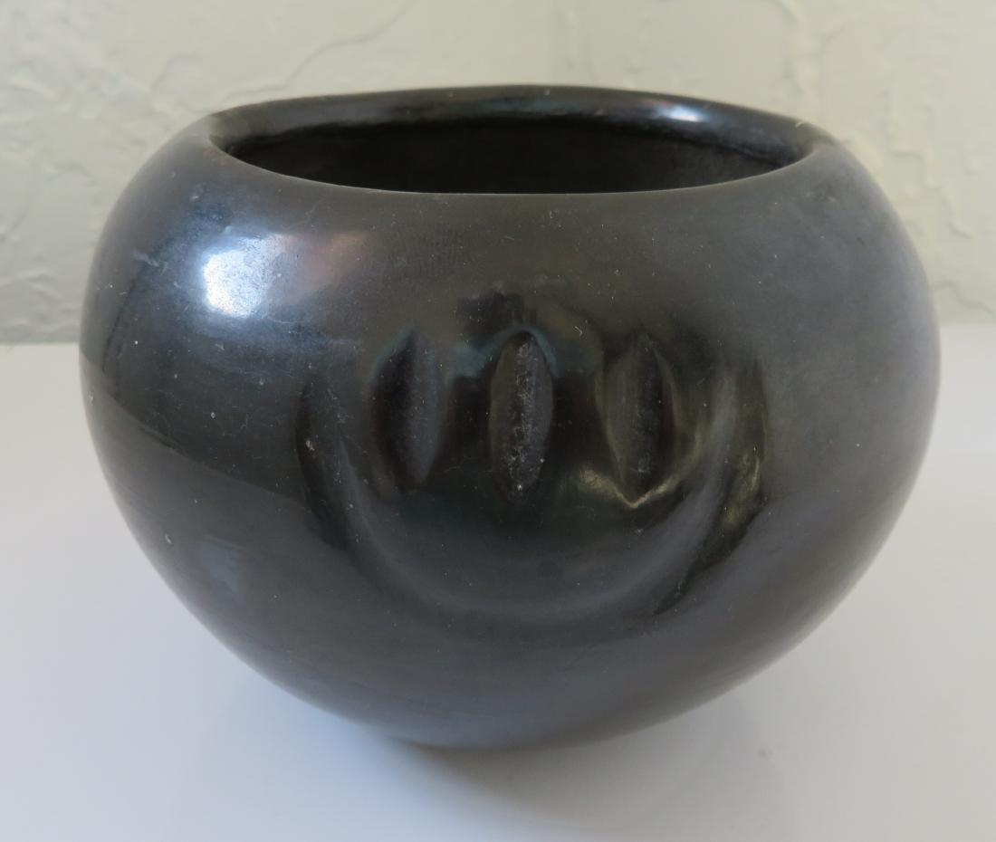 Monica Tafoya Olla: Monica Tafoya Olla, c. 1940s. Made of clay and paint, the item measures 5 1/2" x 5 1/2" x 3 7/8". San Ildefonso Pueblo, New Mexico. Bear paw design. Condition: Good, some wear, see images. Shipping: $