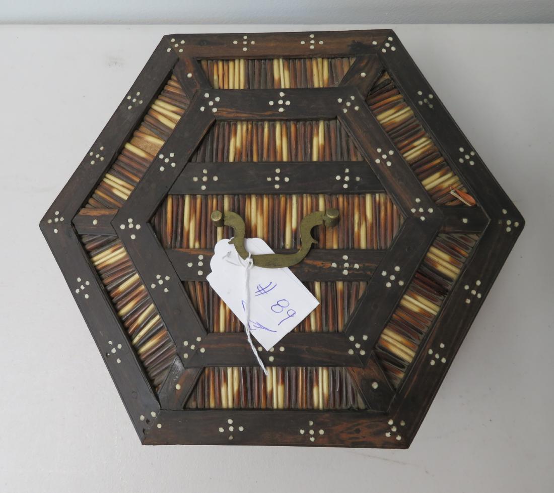 Wood & Porcupine Quill Box: Wood & Porcupine Quill Box, c. 1900s. Made of wood, porcupine quills, and steel, the item measures 11" x 5 1/2". Indonesia. Condition: Good, see images. Shipping: $36.50 USA estimate only, w/insurance