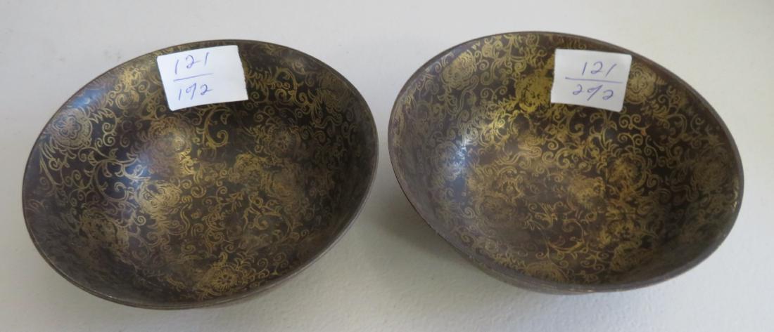 Pair of Chinese Bowls: Pair of Bowls, Ming dynasty. Made of bronze and gold, the items measure 5" each. China. Matched pair of signed bowls. Ex-Heritage of the Americas Museum. Condition: Good, see images. Shipping: $24.50 