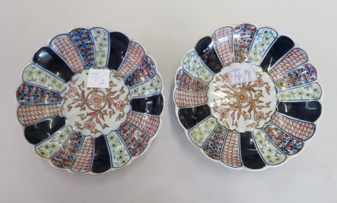 Pair of Imari Bowls: Pair of Imari Bowls, antique items. Made of porcelain, the bowls measure 7" x 2". Japan. Condition: Good, see images. Shipping: $35.50 w/insurance and signature, double-boxed.