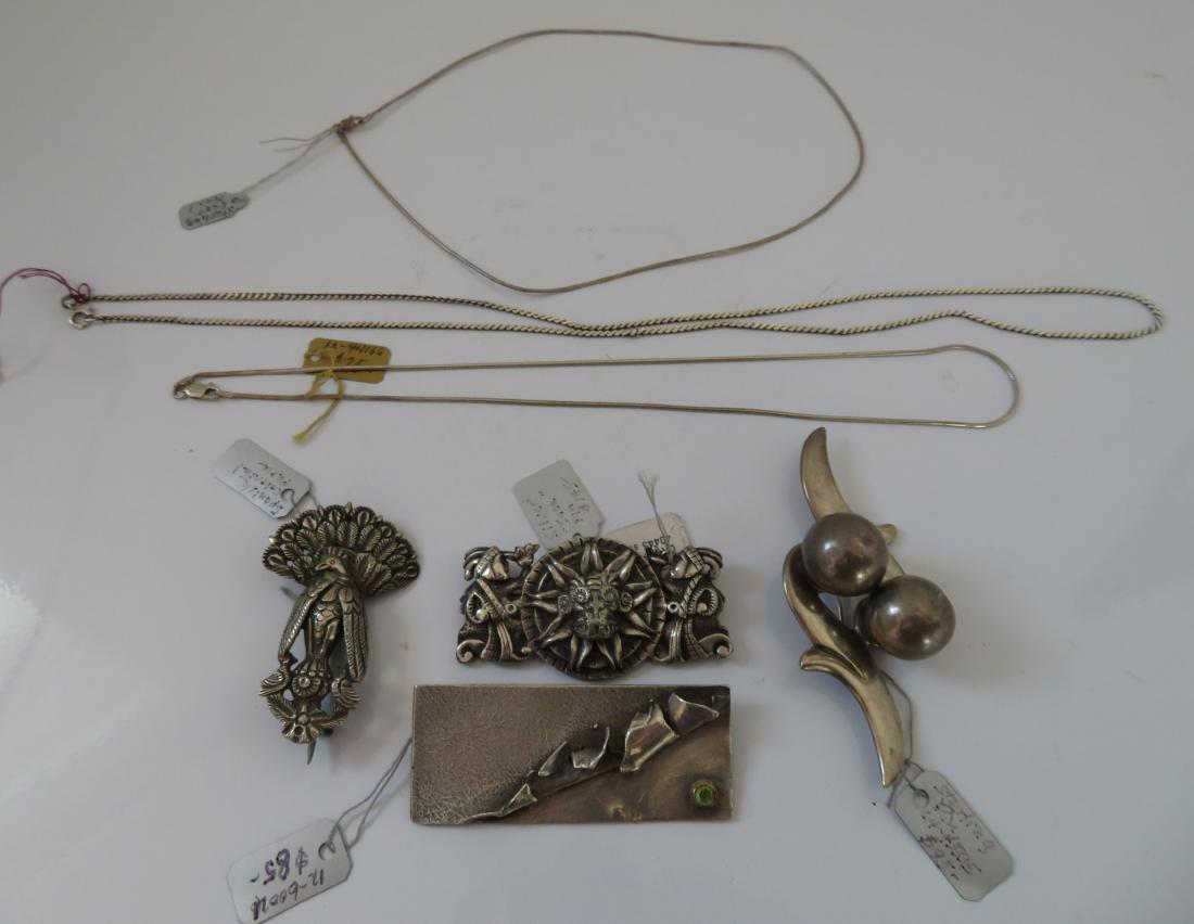 Sterling Silver Jewelry Lot: Sterling Silver Jewelry Lot, antique items. Made of sterling silver and stone, the chains are 7" to 12" long as worn. Total lot weight is approx. 117 grams. Mexico, Peru, other regions. Condition: Goo