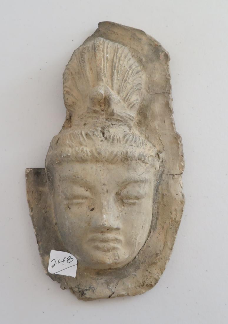 Early Chinese Plaque: Early Chinese Plaque, Ming Dynasty. Made of ceramic, the item measures 10 3/4" x 6" x 2". China. Heavy item. Condition: Sliver missing on left side, see images. Shipping: $34.00 w/insurance and signat