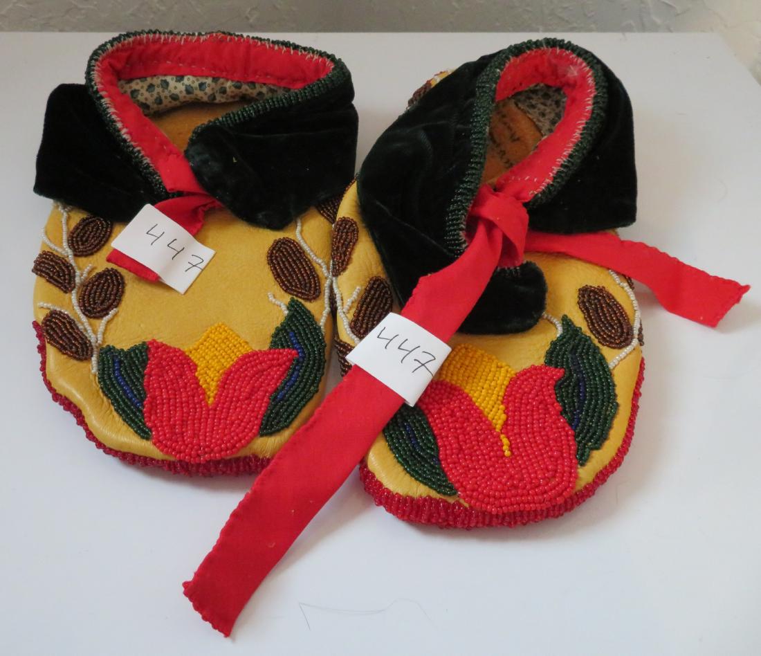 Fully-Beaded Ceremonial Moccasins: Fully-Beaded Ceremonial Moccasins, 20th century items. Made of leather, cloth and glass beads, the items measure approx. 5" x 10" x 3" each. Medicine Wolf Woman, 1998. Beaded flower designs and fully-