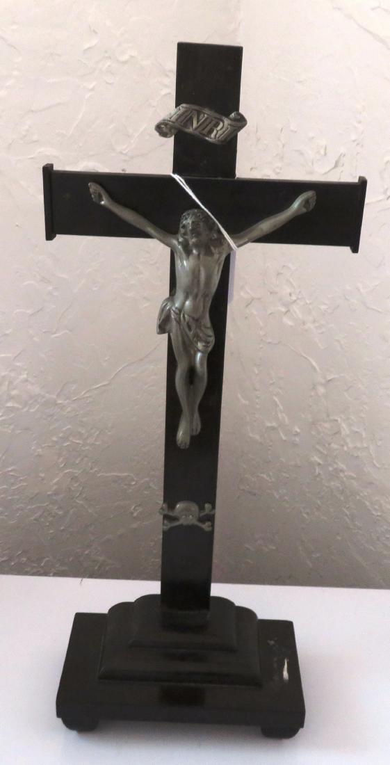 Antique Metal Religious Crucifix on Stand: Antique Metal Religious Crucifix on Stand, c. 1950s. Made of metal with shell eyes on skull, the item measures 6 1/4" x 3 1/8" x 16 1/4" with base. Mexico. INRI plaque, Jesus of Nazarath, the King of 
