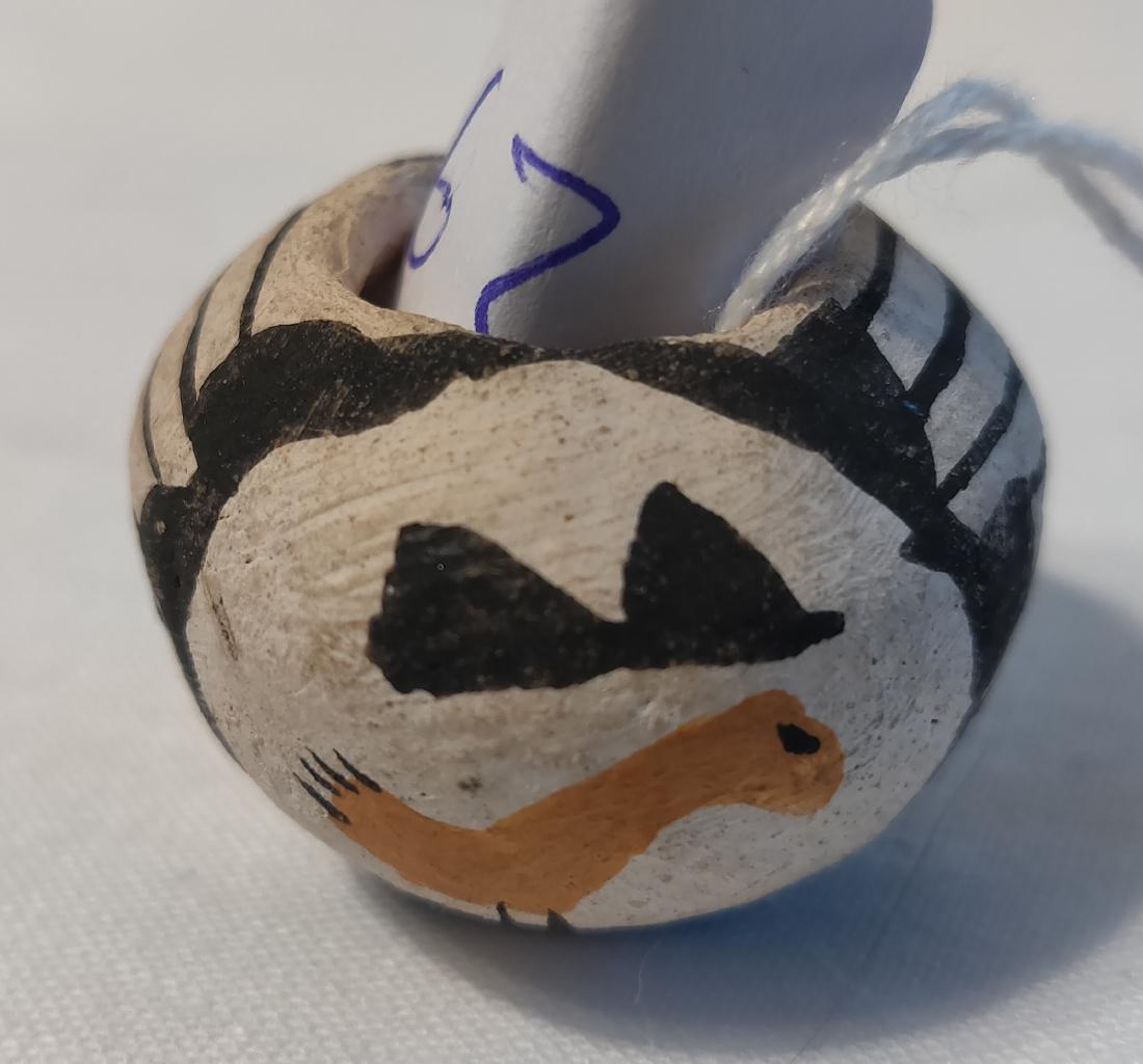 Miniature Pueblo Pot: Miniature Pueblo Pot, c. 1950s. Made of clay and paint, the item measures 1 1/8" x 1 1/16" x 3/4". New Mexico. Condition: Good, some wear, see images. Shipping: $10.00 USA estimate only, w/insurance a