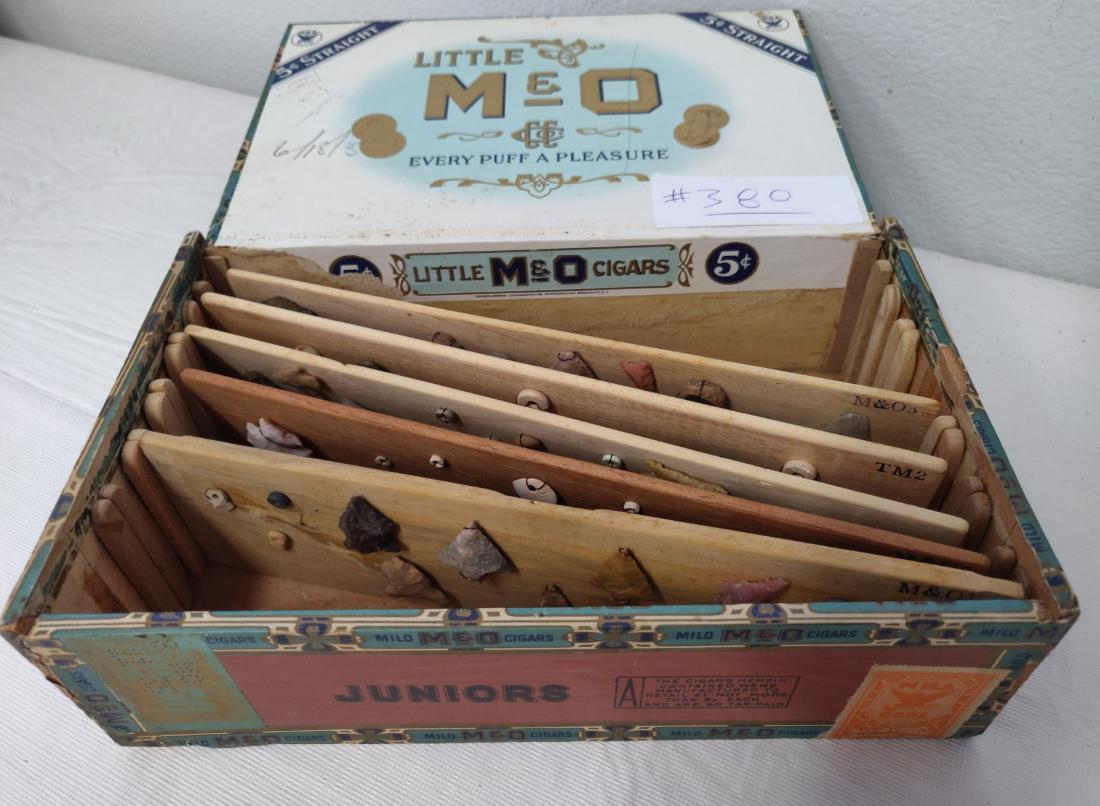 5 Artifact Boards in Cigar Box: 5 Artifact Boards in Cigar Box, pre-historic items. Made of clay, chert, shell and quartz, the longest measures 2". Many from New Mexico. Many mounted with thin copper wire, 1935. Condition: As found,