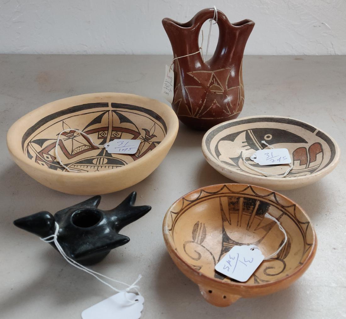 5 Pueblo Pottery Items: 5 Pueblo Pottery Items, c. 1930s-50s. Made of clay and paint, the largest measures 7". Hopi, Santa Clara, Arizona, New Mexico. One signed by Leah Polacca. Condition: Minor wear, see images. Shipping: 