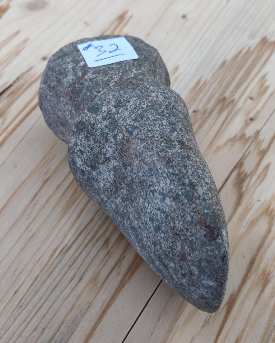 3/4 Grooved Stone Axe: 3/4 Grooved Stone Axe, pre-historic item. Made of granite, the item measures 5 1/2" x 2 1/2" x 2 1/2". Randolph County, Indiana. Condition: Chips on butt end, see images. Shipping: $22.50 w/insurance