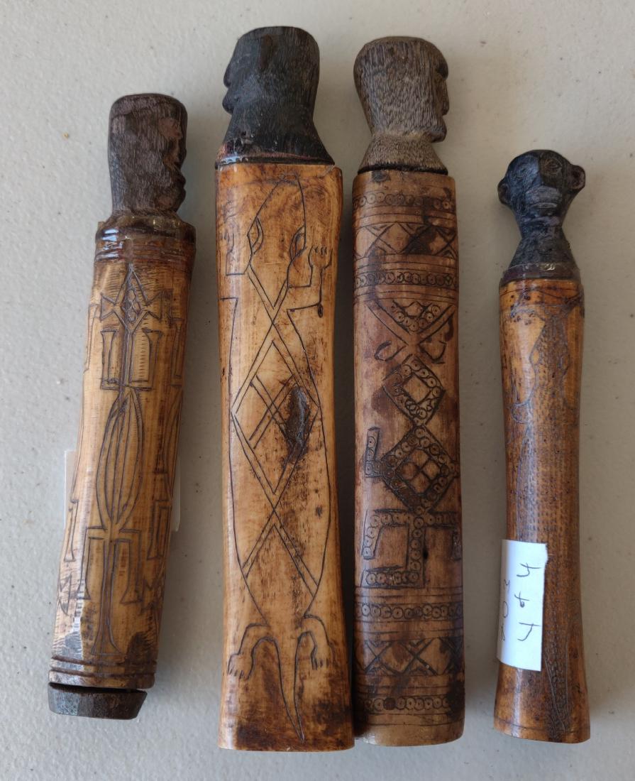 Human Effigy Bone Carvings: Human Effigy Bone Carvings, c. 1950s. Made of wood and bone, the longest measures 6". Indonesia. Condition: Some wear and scratches, see images. Shipping: $20.00 w/insurance and signature, due to valu