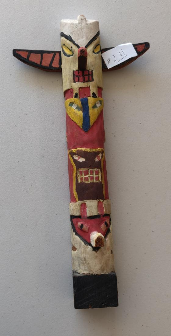 NWC Wood Totem: NWC Wood Totem, c. 1960s. Made of wood and paint, the item measures 12" x 6" x 3". Canada. 4 effigies on totem. Condition: Good, patina nd wear from use, see images. Shipping: $30.00 w/insurance and s