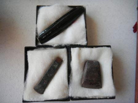 Mayan Artifact Group: Group consisting of obsidian core, miniature copper Celt and miniature stone Celt Measures one to three inches. Shipping $15.00
