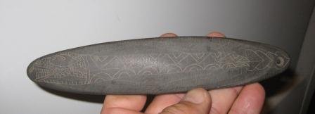 Stone Pendant: Stone slate pendant with a seven inch snake engraved on one side. Age is unknown but item from Indiana. Shipping $12.50. Fair condition with crack on bottom