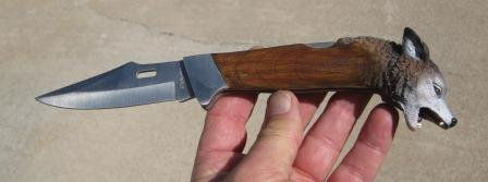 Knife: Wolf Effigy Knife. Stainless - overall length is 10 inches. Modern. Shipping $10.00